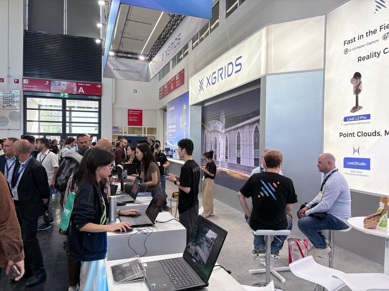 Visitors at the XGRIDS booth, INTERGEO 2026